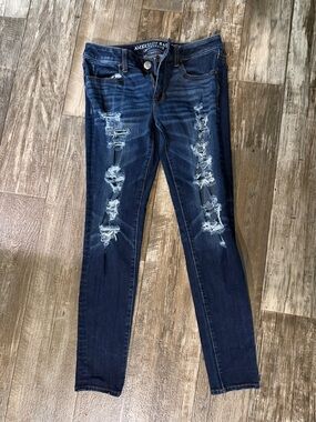 American Eagle Outfitters Dark Blue Distressed Skinny Jeans - Women's